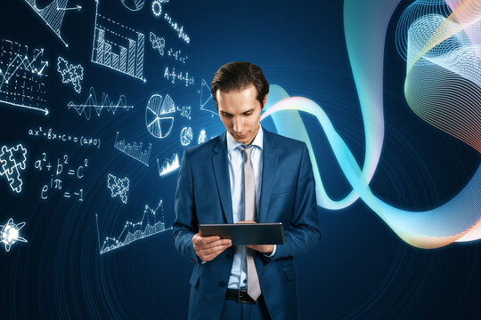 Portrait of attractive young european businessman using tablet with glowing mathematical formulas hologram on blurry blue background. Equation, digital data and mathematics app concept.