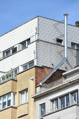 Bruxelles Belgique batiment logement immobilier building maison cheminée inox metal chauffage