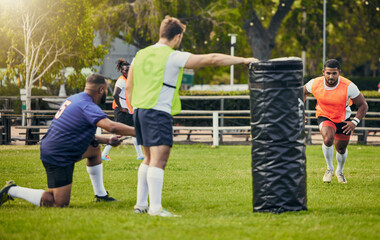 Rugby, teamwork and men training on field with equipment ready for match, practice and sports game....