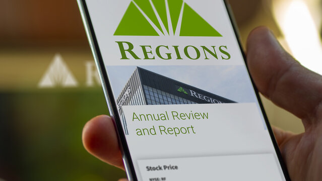 March 2023. An investor analyzing the Regions Financial Corporation results. A bank customer looks at the Regions bank report.
