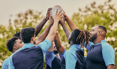 Diversity, team and men hands together in sports for support, motivation or goals outdoors. Sport group holding rugby ball in fitness, teamwork or success for match preparation or game