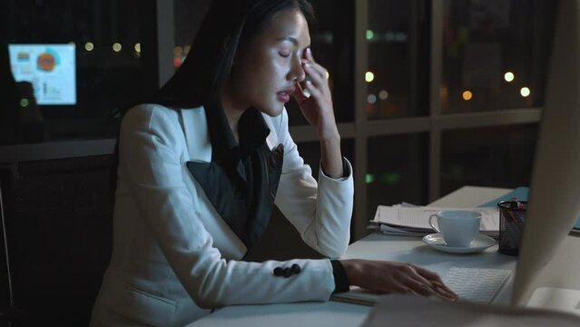 Businesswoman hard working to late night and work overtime at office. Manager assigns task after timeout of work. Concept of business management, assignment job late and working overtime.