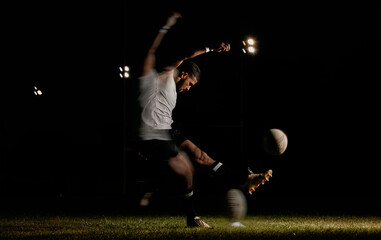 Rugby, night and man kicking ball to score goal at dark stadium at game, match or practice workout....