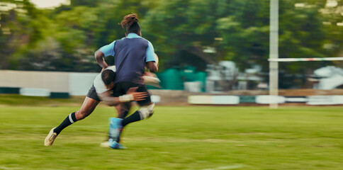 Obraz premium Rugby, tackle and action, black man running to score goal on field at game, match or practice workout. Sports, fitness and motion, player in action and blur on grass with energy and skill in sport.