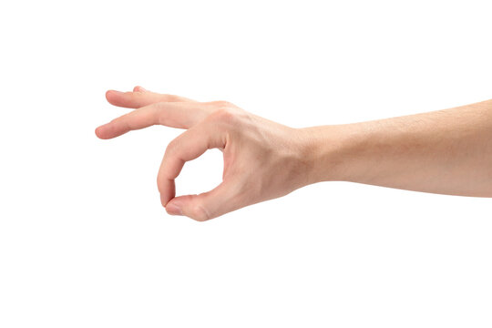 Male hand holding something, cut out