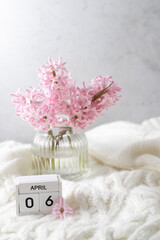 Pink hyacinth in vase and calendar date April 6. Included in the group of horizontal and vertical photos with all April dates