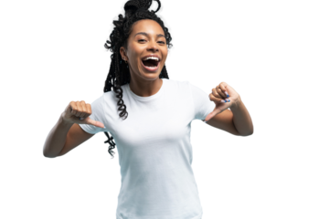 Smiling African American woman wearing white t-shirt pointing finger at her t-shirt, satisfied young female client customer showing great shopping offer, sale, isolated on transparent background