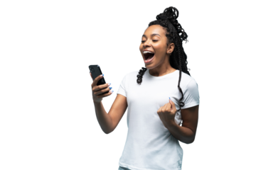 Positive curly haired ethnic woman uses mobile phone checks messages and reads news holds modern cellular in hands looks with curious happy expression isolated over transparent background