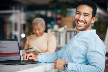 Portrait, smile and business man in office with pride for career, occupation or job. Ceo, night and happy, proud and confident Asian professional entrepreneur sitting at table with laptop in company.