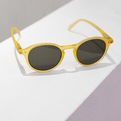 yellow frame sunglasses isolated on white background