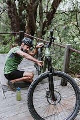 hispanic Senior man on his mountain bike cycling outdoors in Mexico Latin America 
