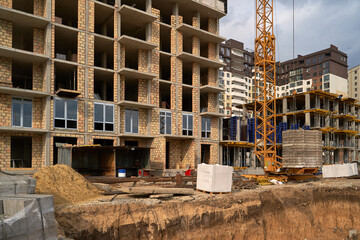 Construction site. High rise Building under construction. Construction of high-rise residential building