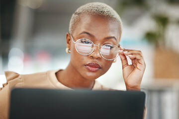 Office, laptop and black woman, reflection in glasses and thinking, checking email or search on...