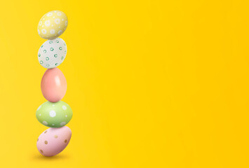Stack of Easter eggs on yellow background, space for text