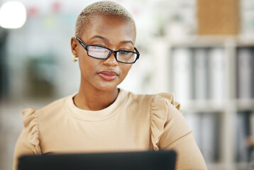 Office, laptop and black woman with glasses, internet research and checking online report or email....