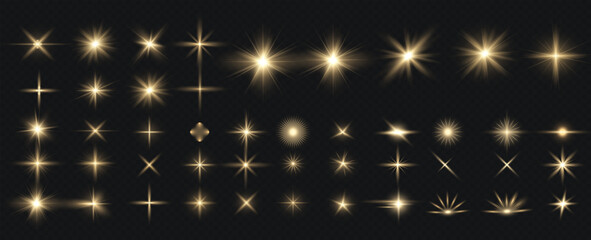 Golden particles of light. Golden light. Light flare.Stars isolated on transparent background.