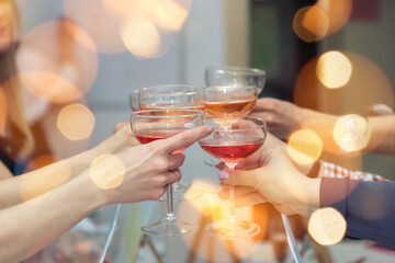 Hands with champagne. Girls are celebrating. Girls are drinking champagne	
