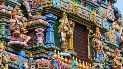 Fototapeta na wymiar Art details of colorful Hindu temple