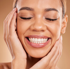 Smile, self love and hands on face of woman in studio for makeup, skincare and cosmetics on brown background. Closeup, beauty and happy girl model relax with natural and glowing skin while isolated