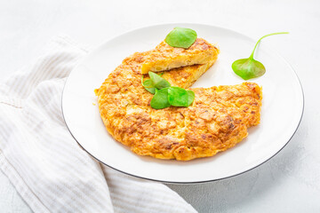 Spanish omelet (Tortilla de patatas) with potatoes and onion