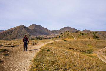 Obraz premium Young hiker girl enjoying in Camporrells, Pyrenees, France