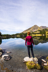 Young hiker girl enjoying in Camporrells, Pyrenees, France