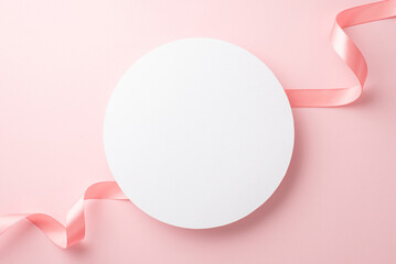 Women's Day concept. Top view photo of white circle and silk ribbon on isolated pastel pink background with copyspace - obrazy, fototapety, plakaty