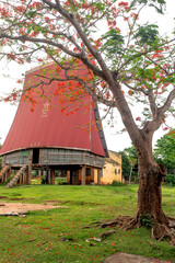 Rong house in Bahnar villages in Highland Vietnam. Rong house is used as a place to organize festivals, village meetings, is the communal house of Bahnar, Jar in Kon Tum Province, Vietnam  © Quang