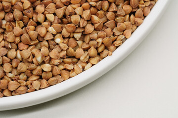 Buckwheat Groats Dry Uncooked Raw Natural Fresh Brown. Roasted buckwheat kernels. Healthy organic food. Background. 