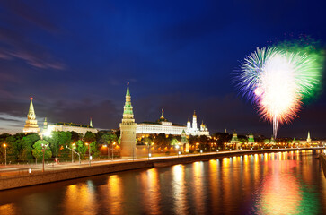 Fototapeta na wymiar Fireworks over the Moscow Kremlin and the Moscow river, Russia