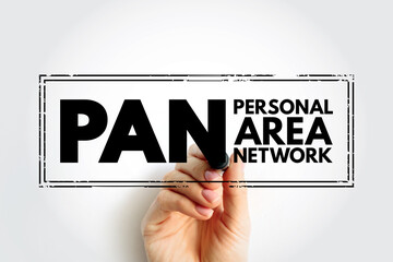 PAN Personal Area Network - computer network for interconnecting electronic devices within an individual person's workspace, acronym text stamp concept background
