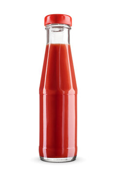 Glass bottle of red tomato ketchup isolated on white with clipping path. Popular condiment.