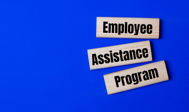 Three wooden blocks with the text EAP Employee Assistance Program
