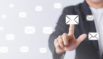 e-mail and marketing concept. Double exposure Businessman touch Email pressing for sending the...