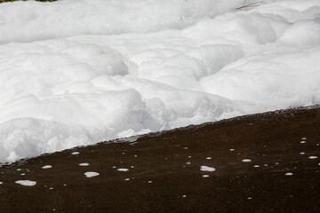 Environmental Hazard: Toxic PFOS Chemical Fire Foam Floating Down the Street, PFAS Firefighting Chemicals