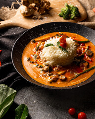 thai rice and vegetables served in a bowl