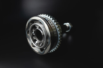 Auto CV joint Connecting the drive shaft on a black background. New hinges of equal angular speeds....