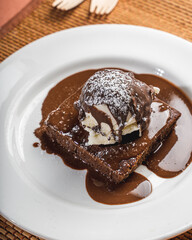 chocolate waffle with sprinkled powdered sugar 