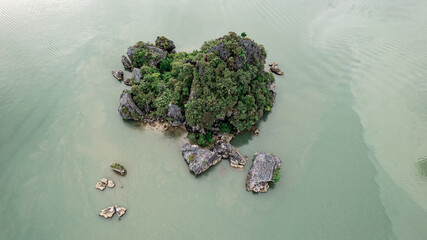 Obraz na płótnie Canvas Aerial view of an island limestone in Phang Na Bay Thailand