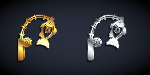 Gold and silver Fishing rod and fish icon isolated on black background. Fishing equipment and fish farming topics. Long shadow style. Vector