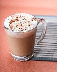 latte coffee in a cup with whipped cream