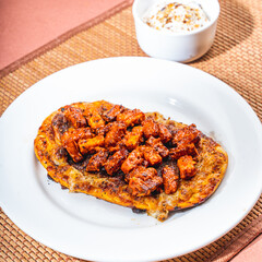 Naklejka premium spicy parantha indian food with grilled cottage cheese & meat on top 