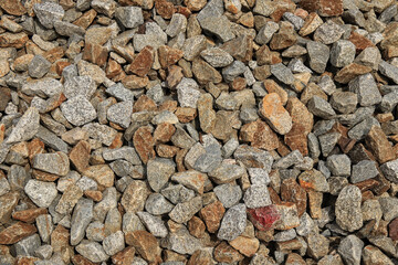 Close-up shot of yellow-red granite heaps. born as wallpaper