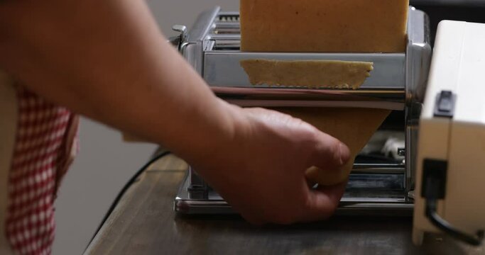 Captivating hands weave intricate patterns with chebakia dough&mdash;a culinary dance of skill and tradition