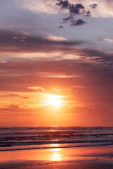 Beach view with cloudy sunlit skies over the ocean at, Gold Coast Australia