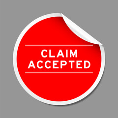 Red color peel sticker label with word claim accepted on gray background
