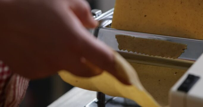 A culinary spectacle unfolds as nimble hands intricately braid and shape chebakia dough with precision