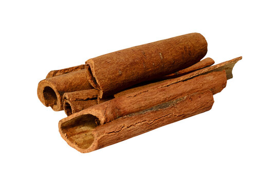 Cinnamon sticks isolated on transparent background. Three aromatic spice pieces close-up. Dried fragrant plant bark for cooking. Photo element for packaging design, advertising layout, cafe menu cover