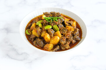 sambel goreng ati ampela is Indonesian food made from spices, chili, gizzard and liver chicken, potatoes and petai
