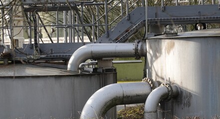close-up of pipes and container of a sewage plant